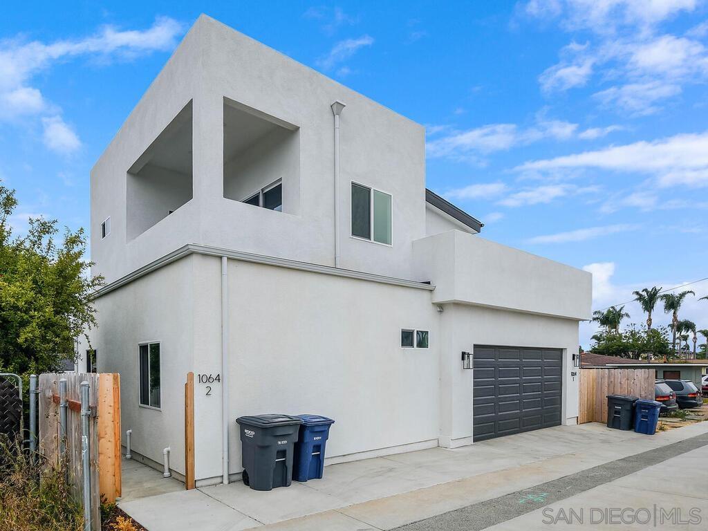 a view of a house with a garage