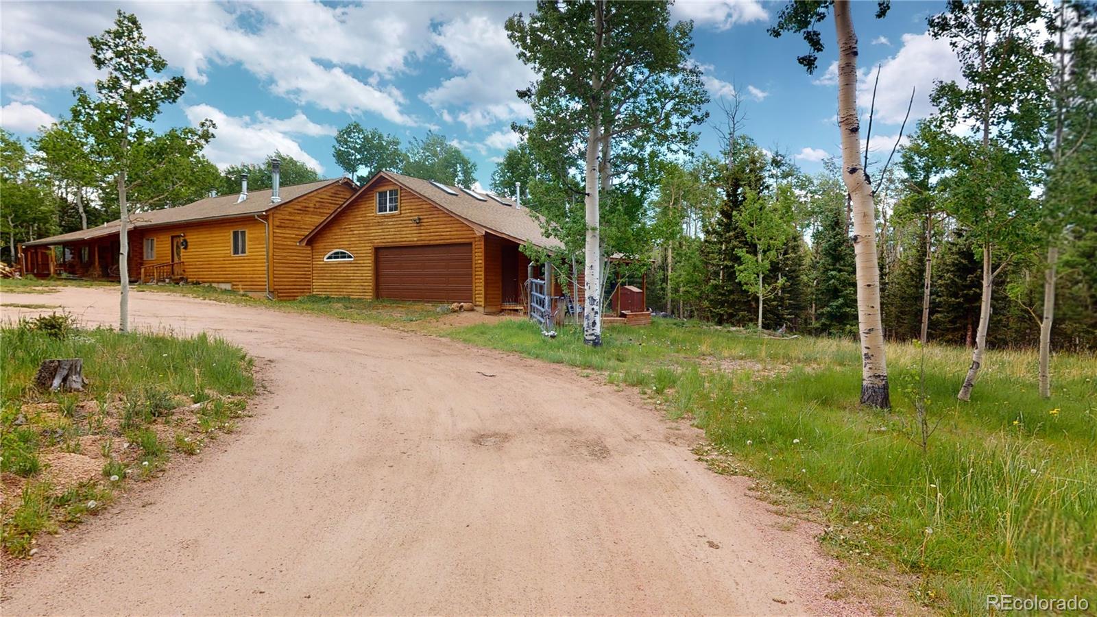 a front view of a house with yard