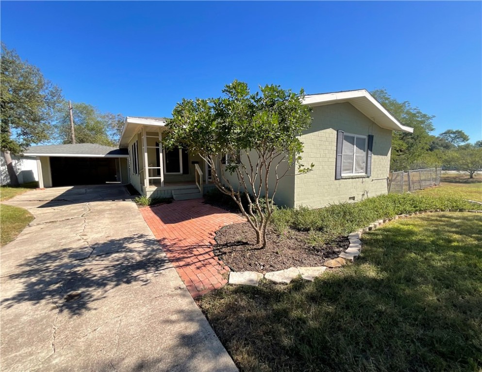 a house with trees in the background