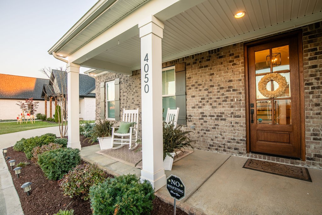 Covered Front Porch with plenty of room for chairs.