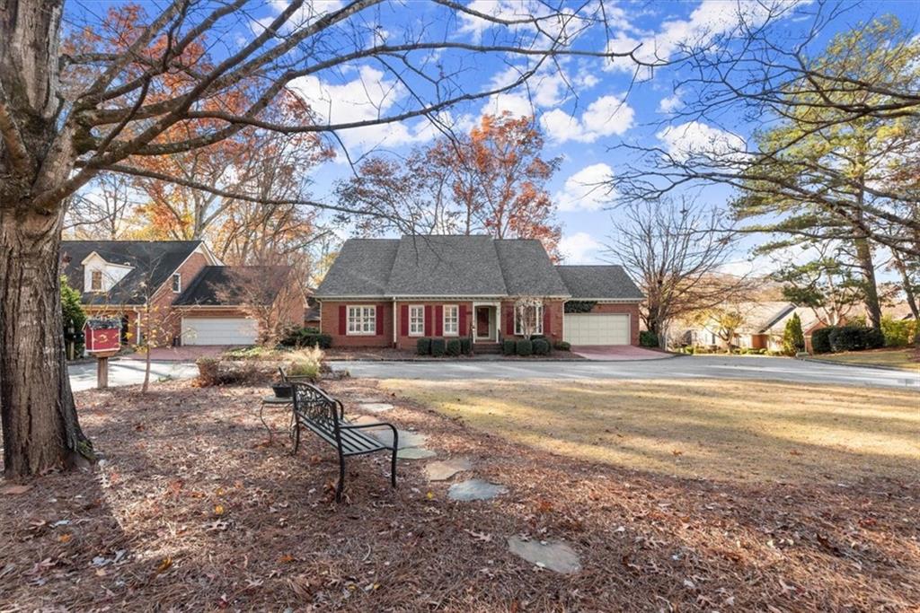 a view of a house with a yard