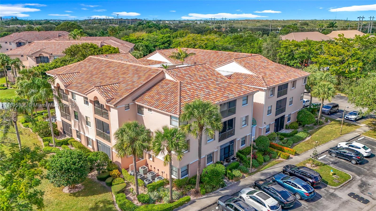 an aerial view of multiple houses with yard