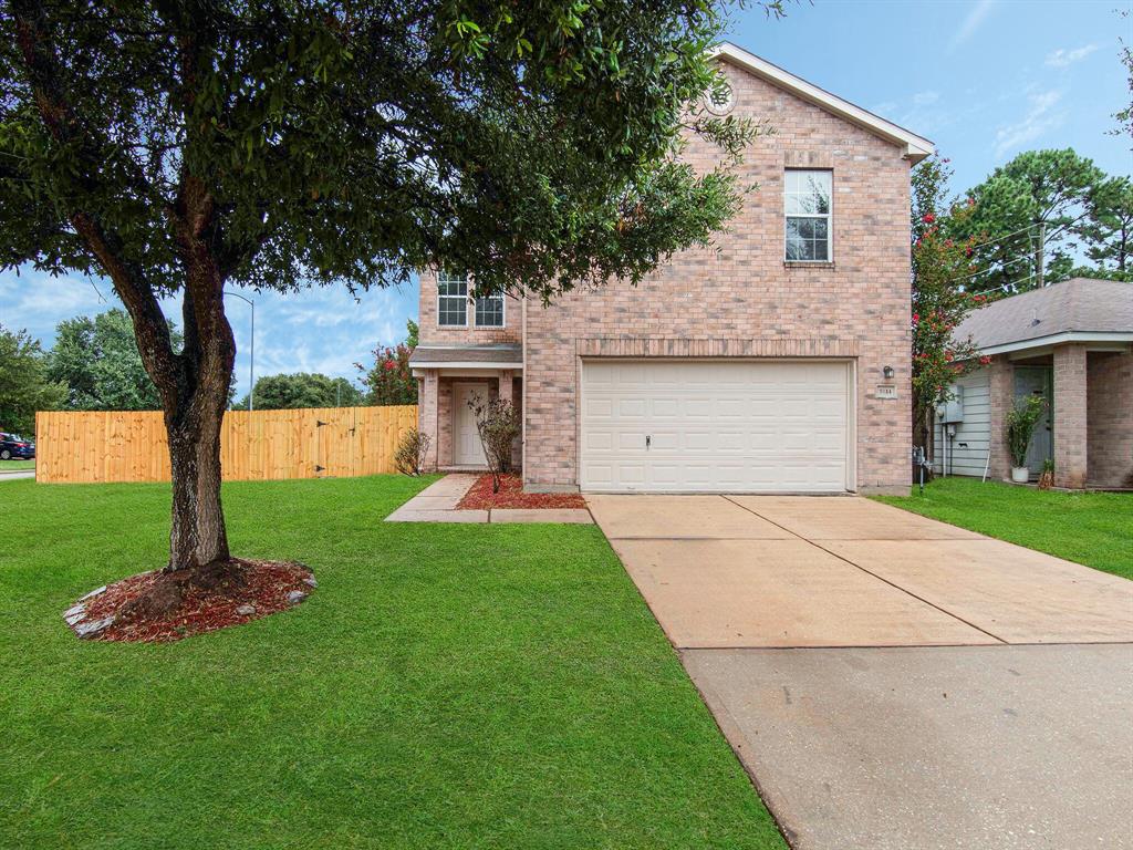 a house view with a garden space