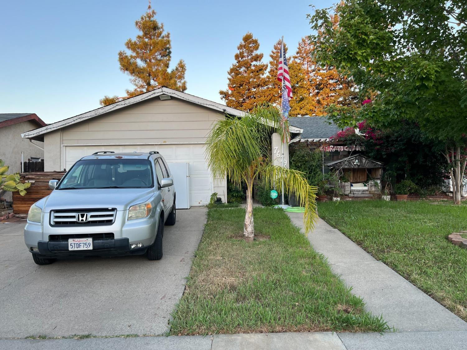 a car parked in front of a house