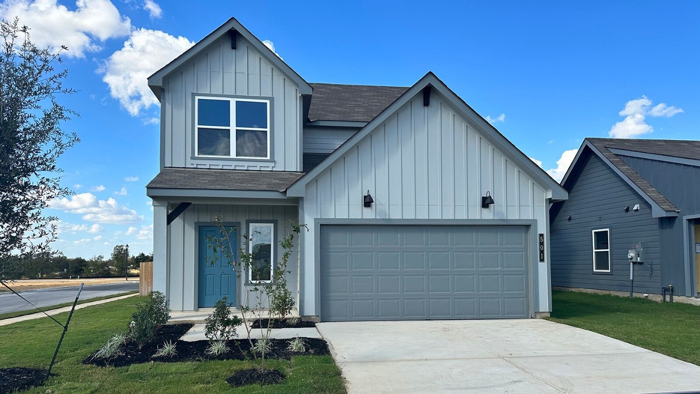 a front view of house with yard