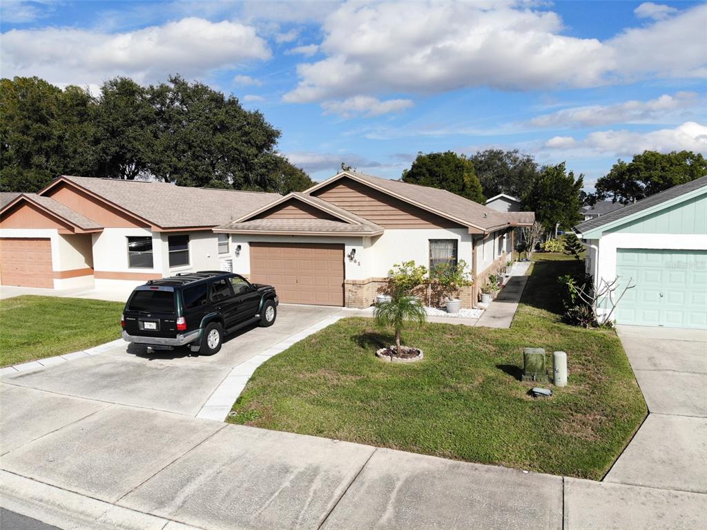 a view of a house with backyard