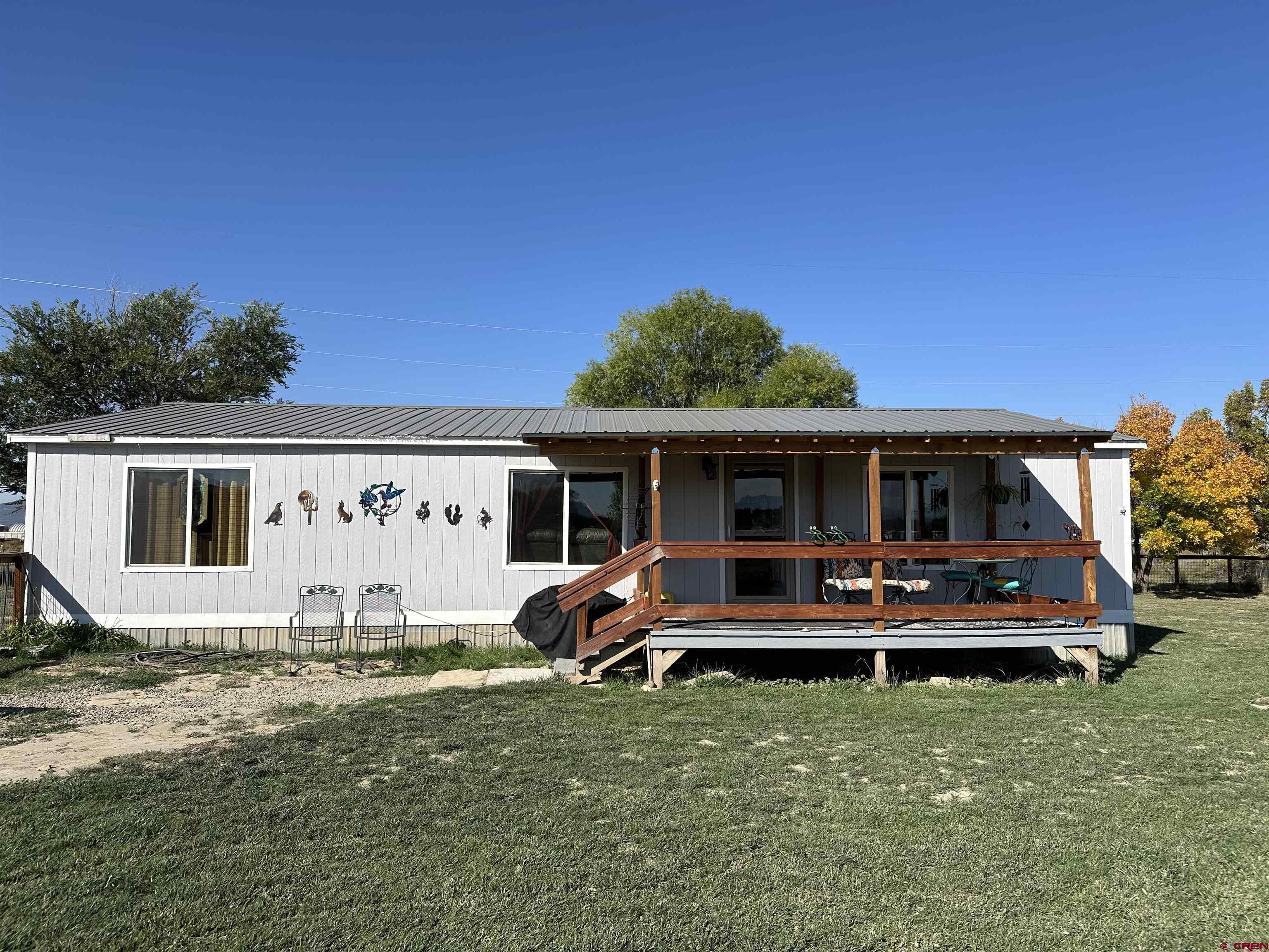 a front view of house with garden