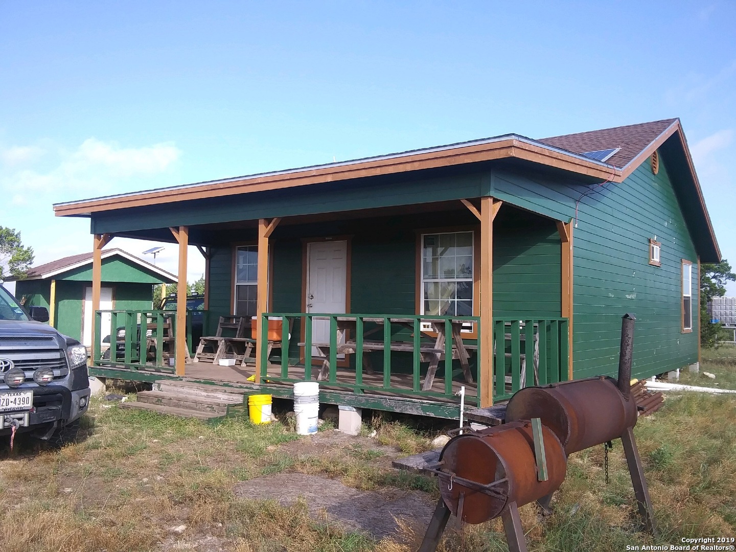 a view of house with outdoor seating space