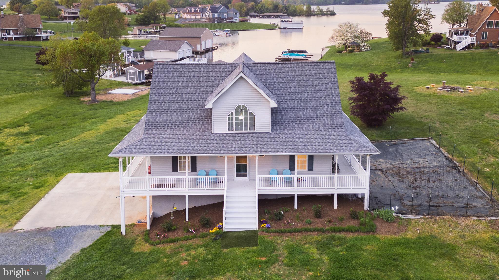 an aerial view of a house with a garden