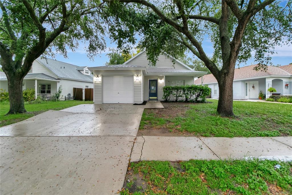 front view of a house with a yard