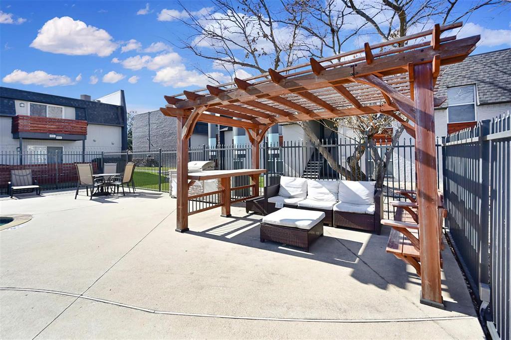 a view of backyard with a patio