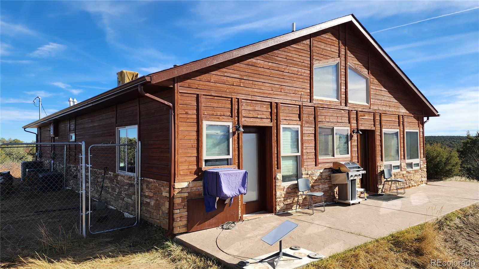 a view of house with a outdoor space