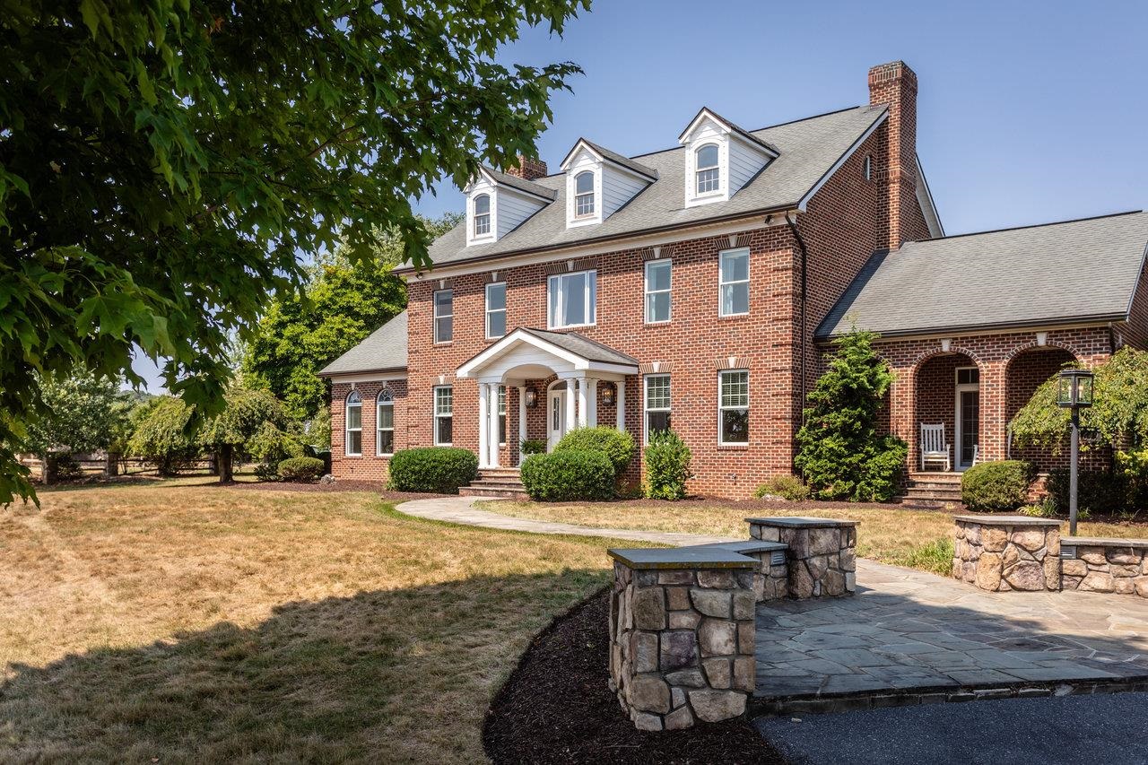 This outstanding all brick colonial home with mountain view sits on 5.92 acres