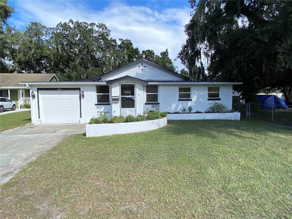 front view of house with a yard