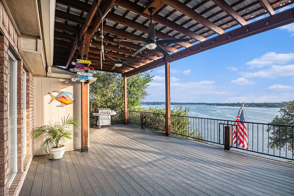 a view of a terrace with wooden floor