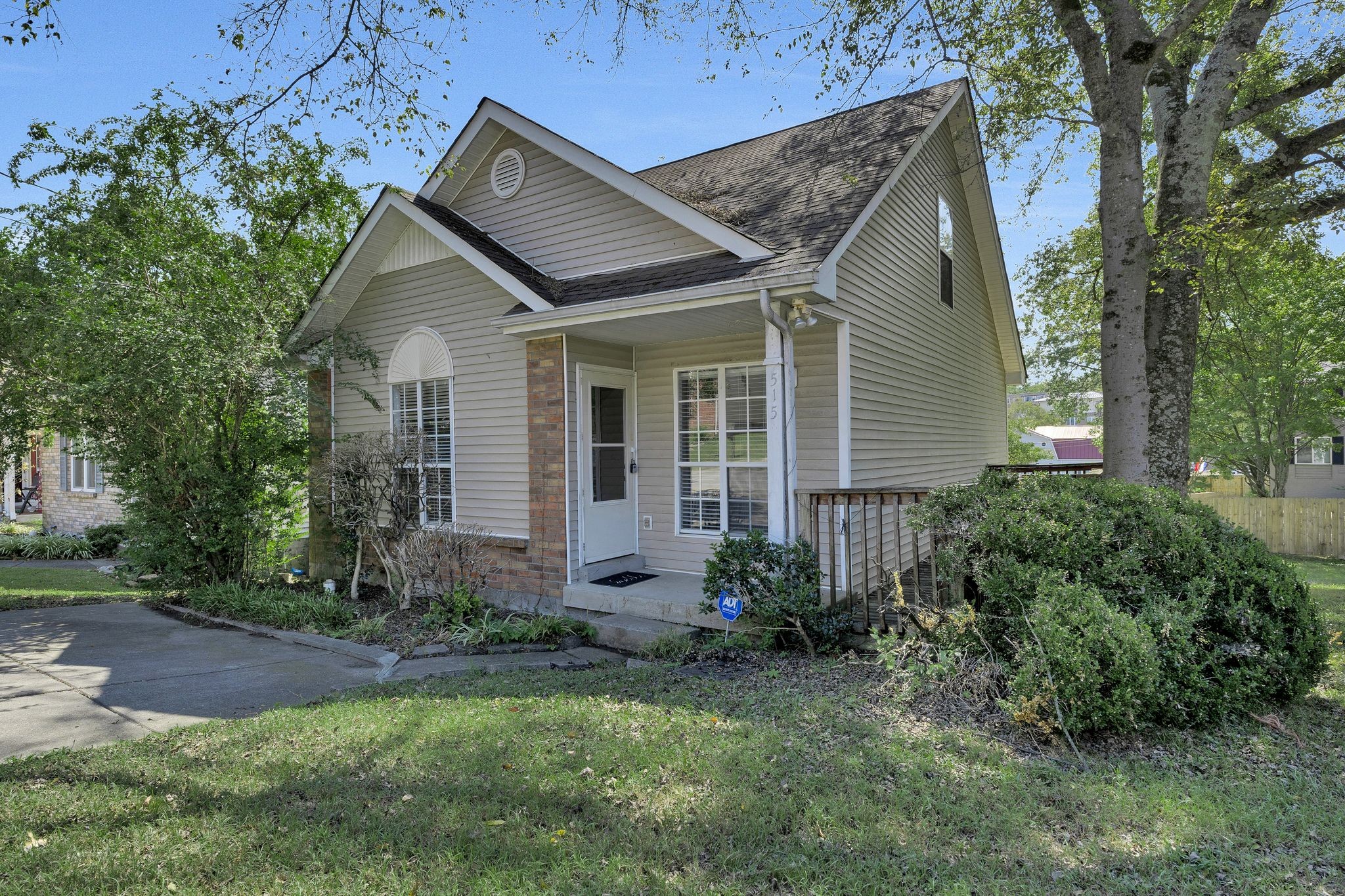 front view of a house with a yard