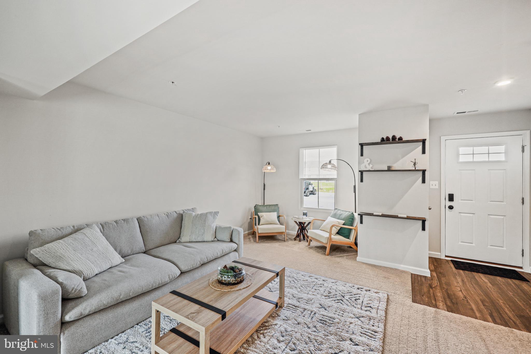 a living room with furniture and a couch