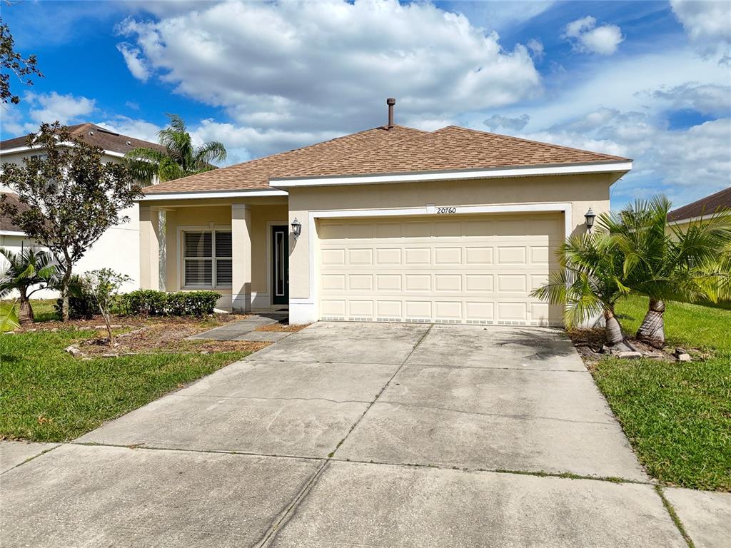 a front view of house with yard