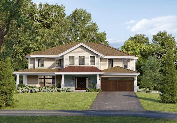 View of front of home with a garage and a front yard