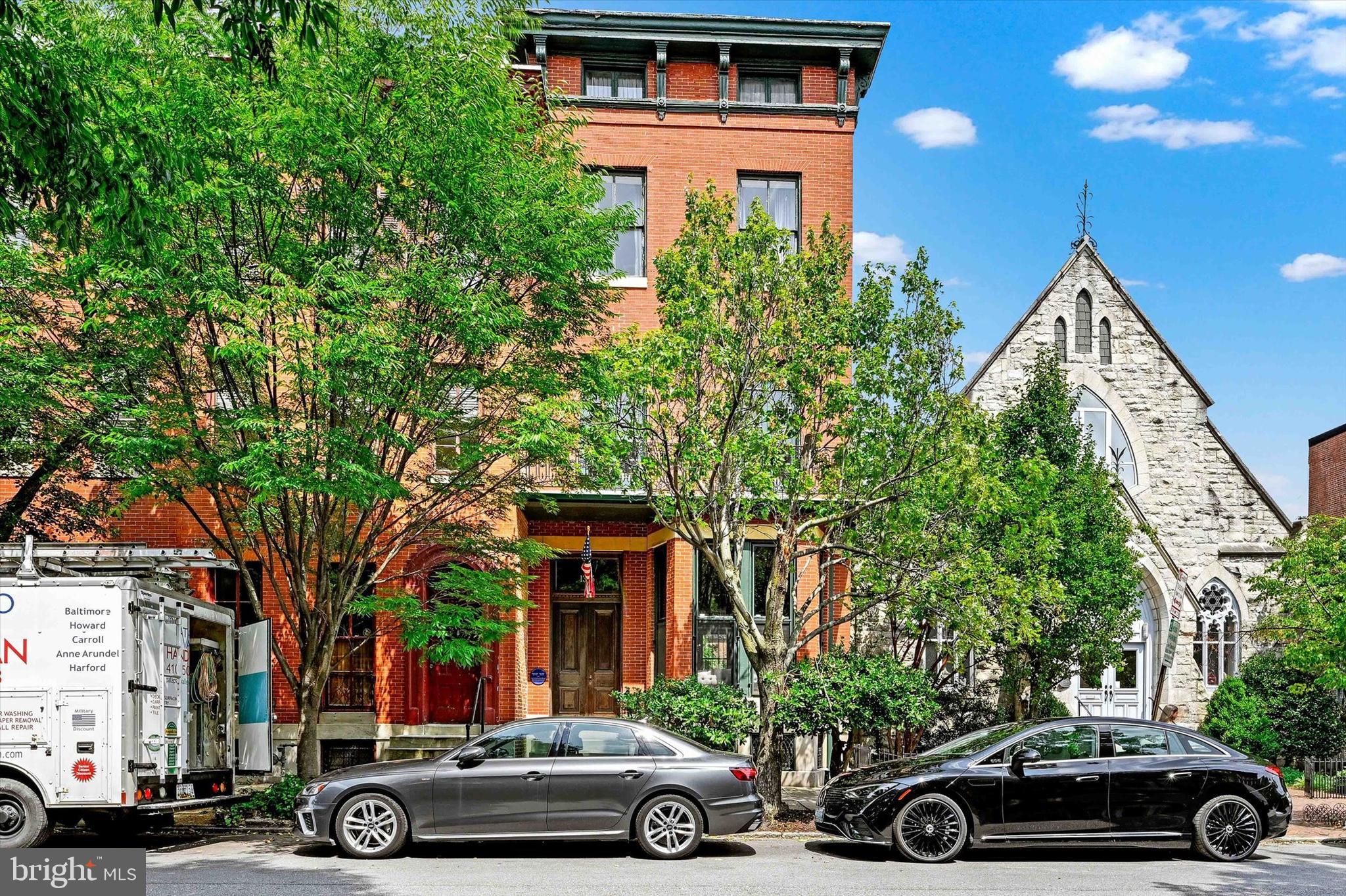 an car parked in front of a house