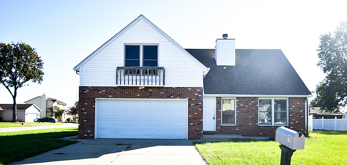 a front view of house with yard