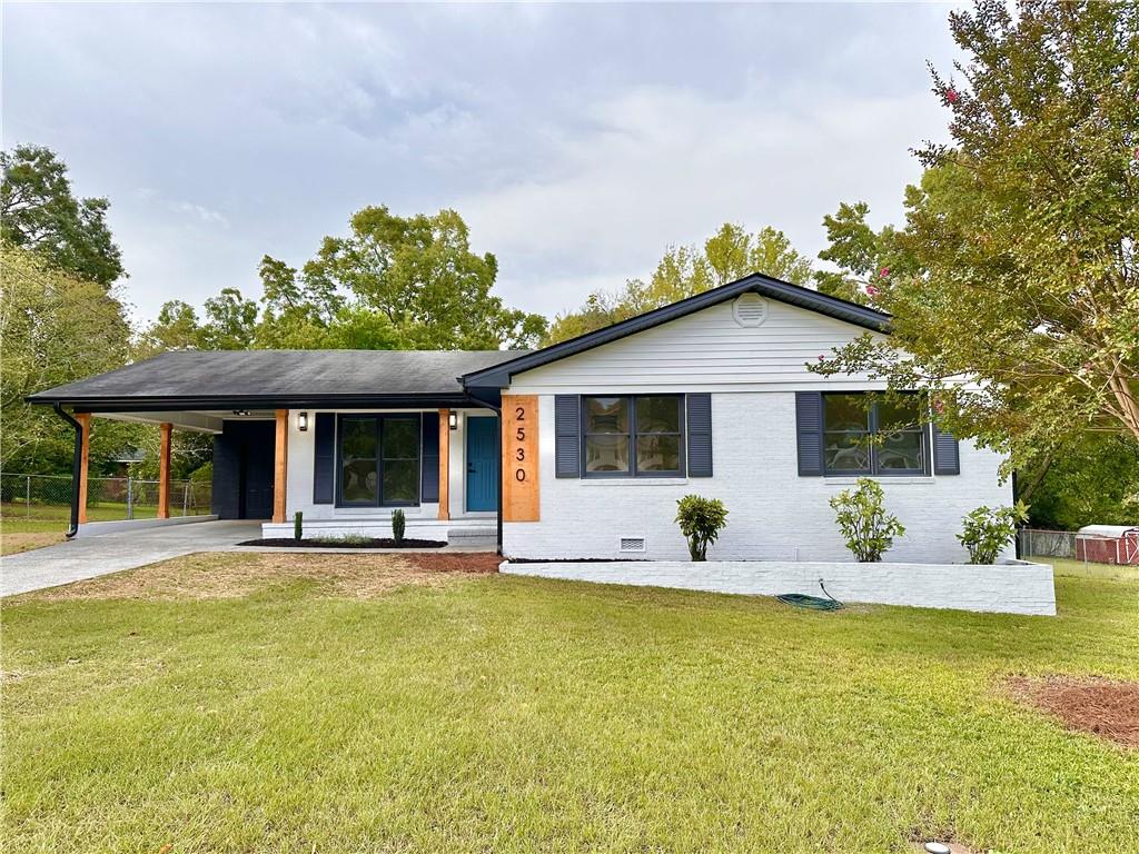 a front view of a house with patio