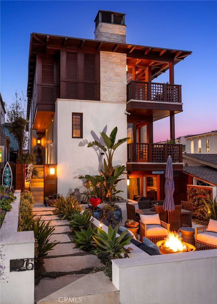 front view of a house with a patio