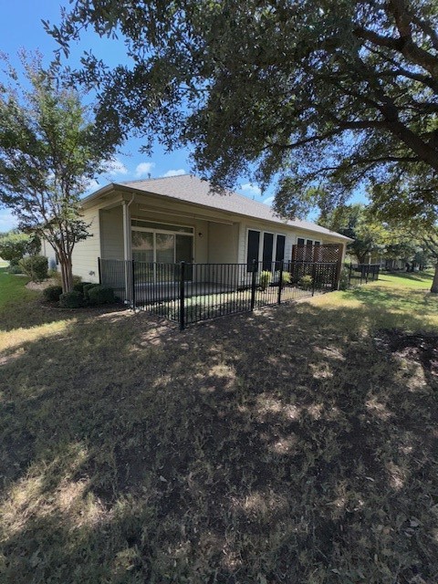 a house with yard in front of it