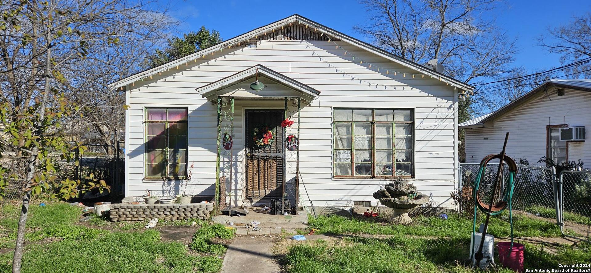 a front view of house with a yard