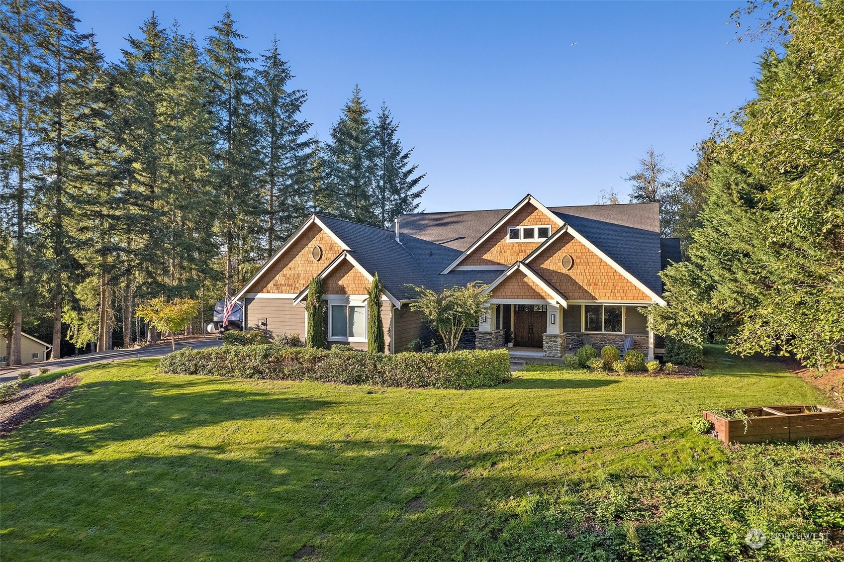 a front view of house with yard and green space