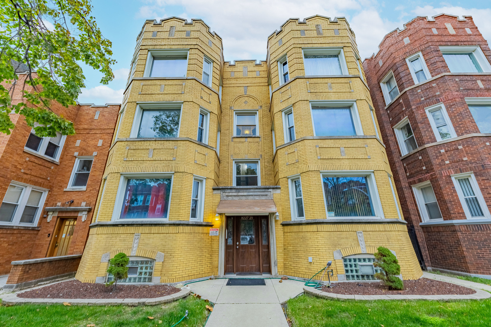 a front view of a multi story residential apartment building