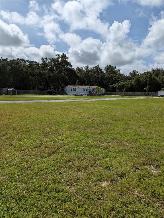 a view of outdoor space and yard