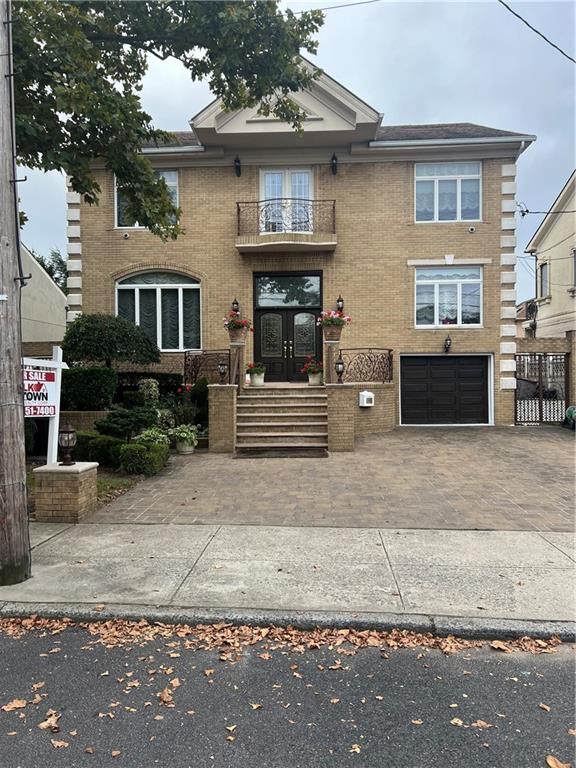 a front view of a house with stairs