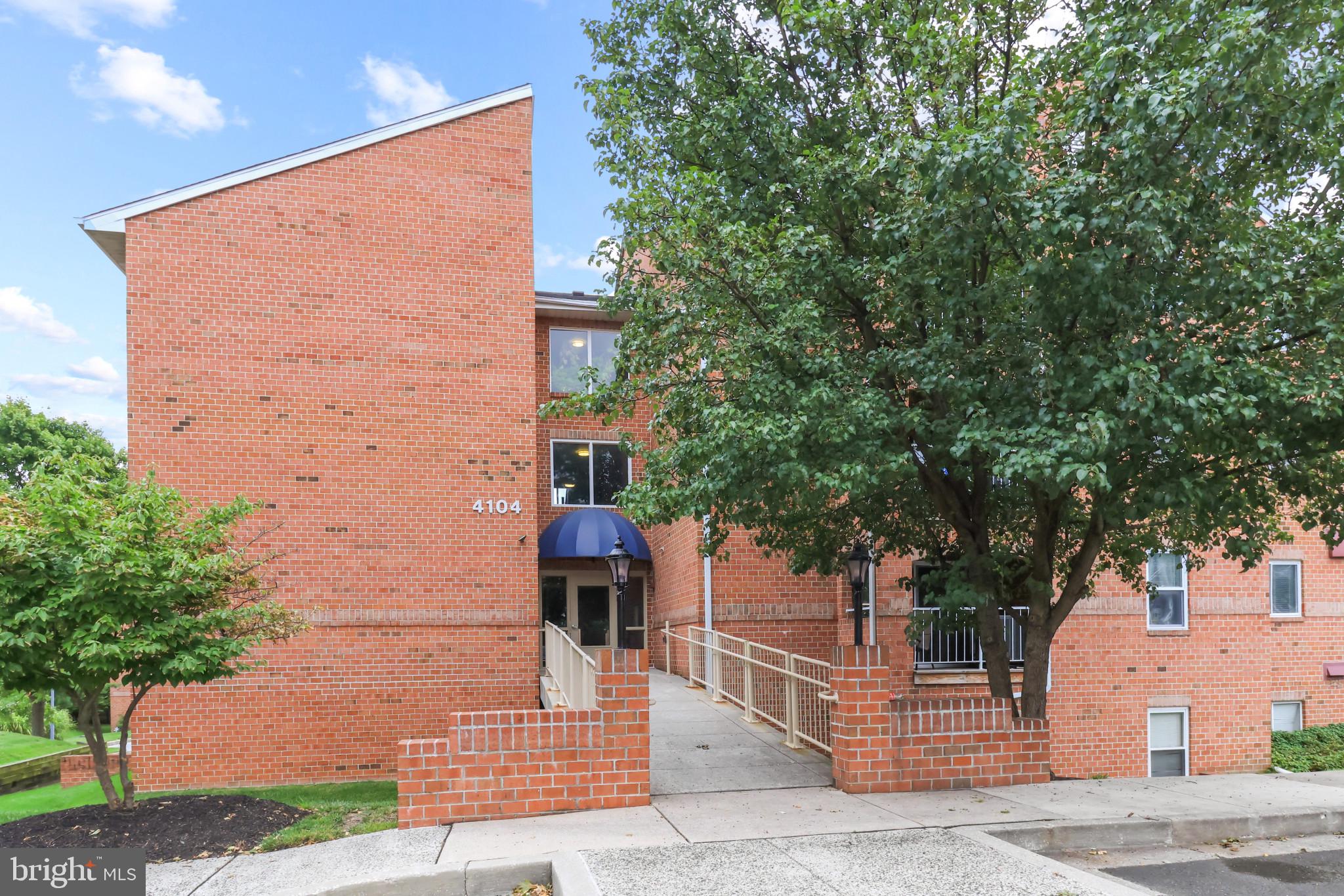 a view of a tall brick building