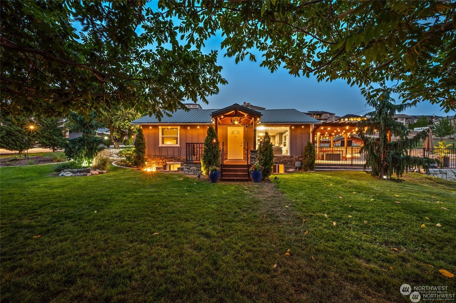 a view of a house with a big yard