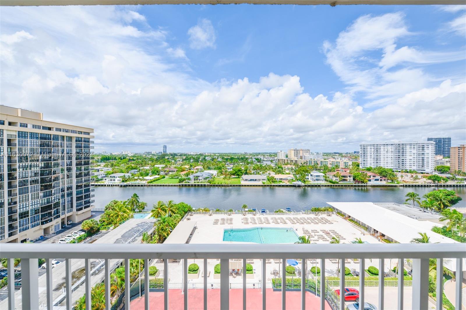 a view of a lake from a balcony