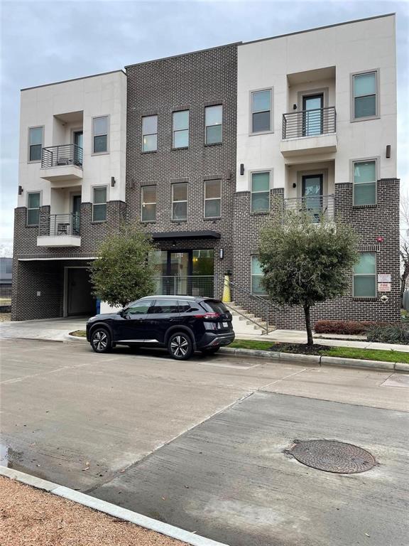 a car parked in front of a building