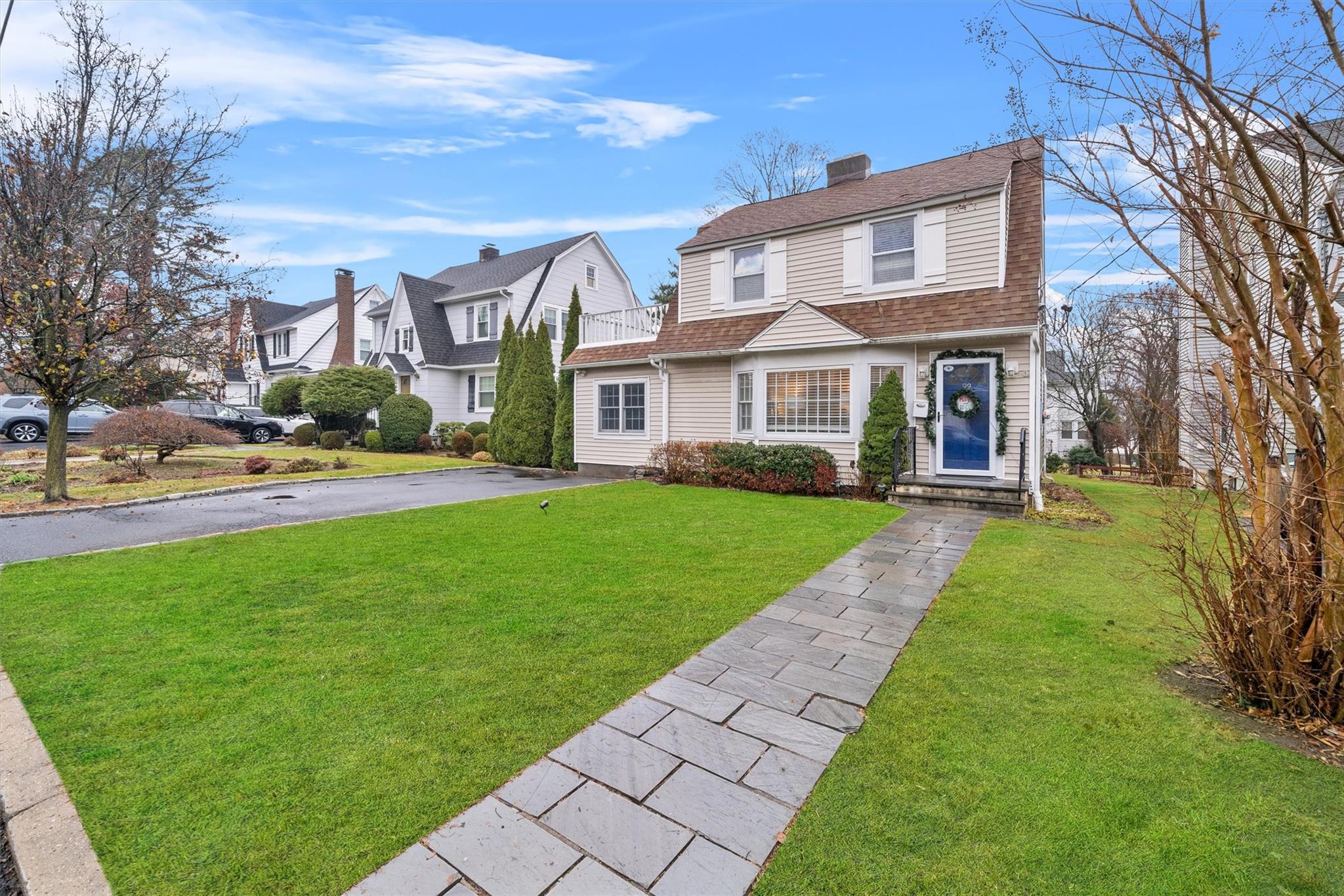 View of front facade with a front lawn