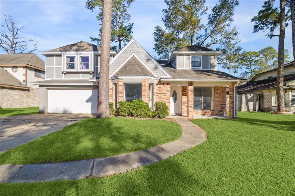 front view of a house and a yard