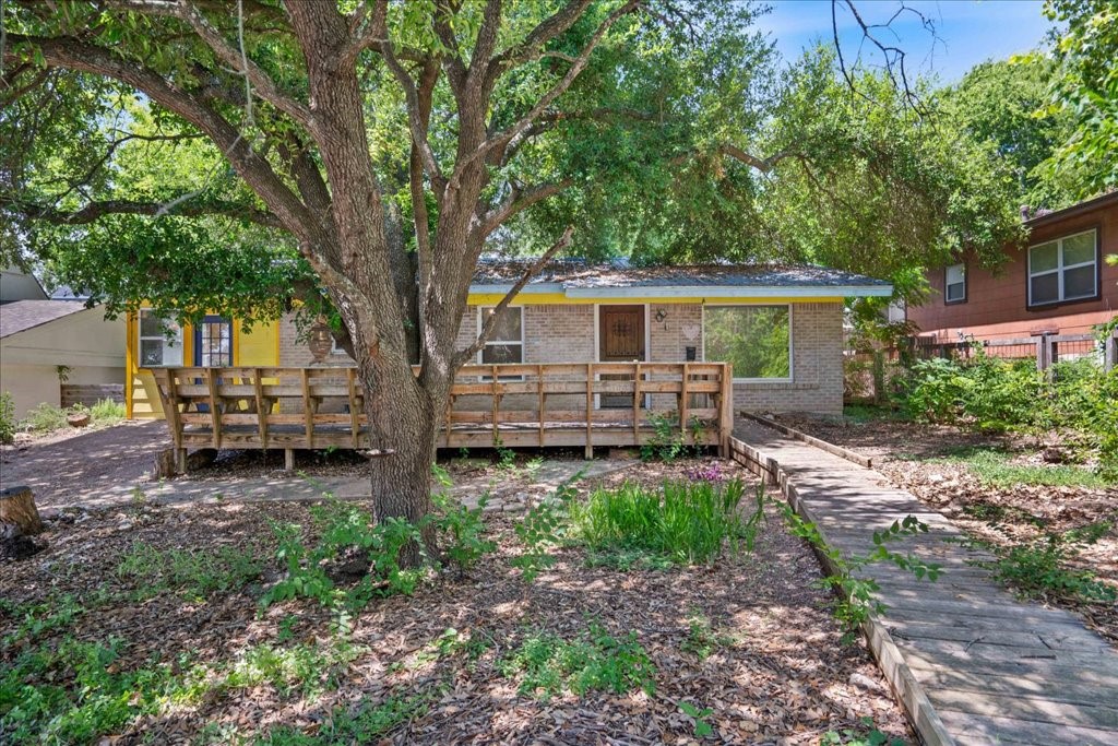 a backyard of a house with seating space