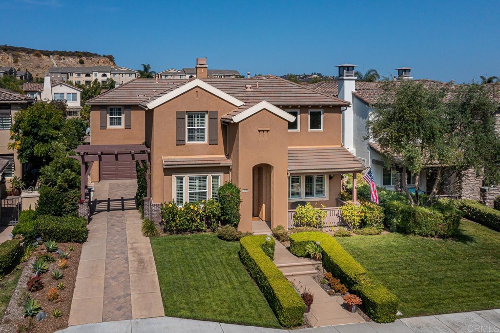 front view of a house with a yard