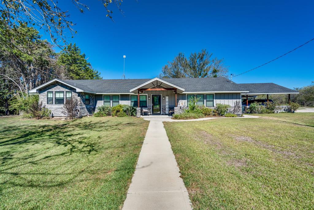 a front view of house with yard