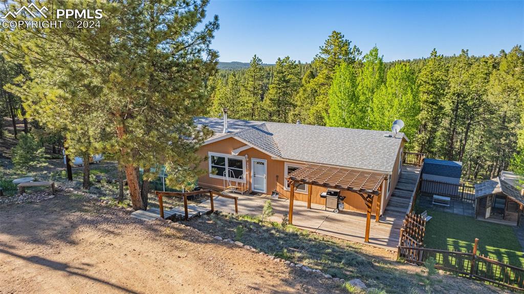 View of front of home featuring a deck