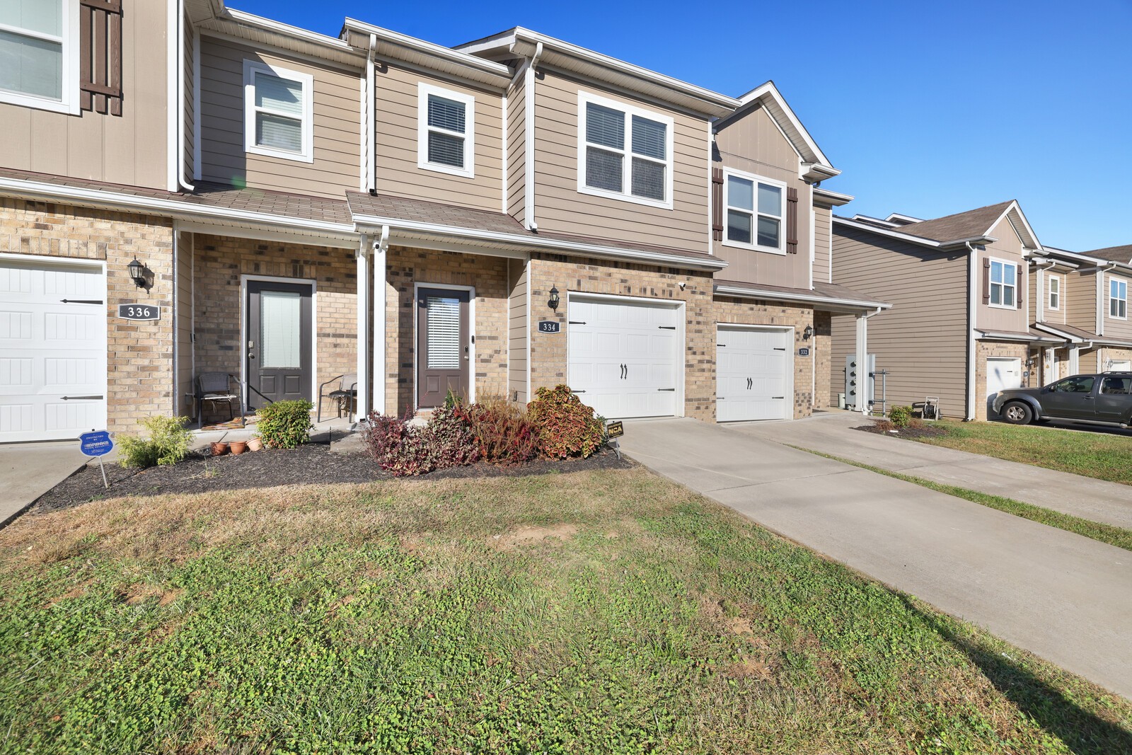 front view of a house with a yard