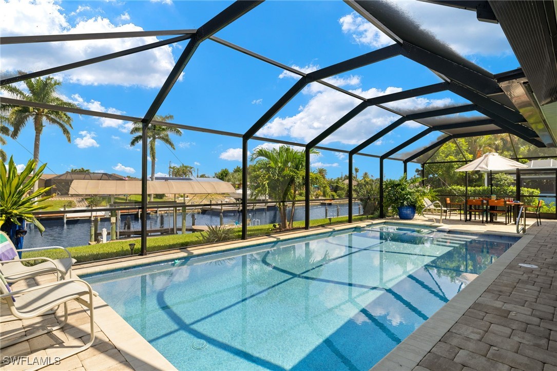 a view of a swimming pool with a porch