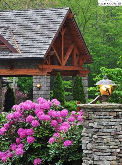 a view of a backyard with sitting area