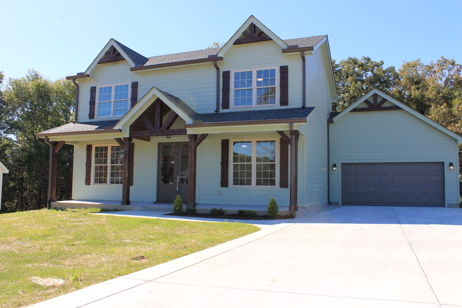 Awesome Curb Appeal with elegant covered Front entryway to welcome you and your guest.