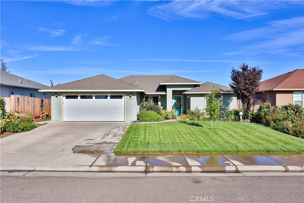 front view of a house with a yard