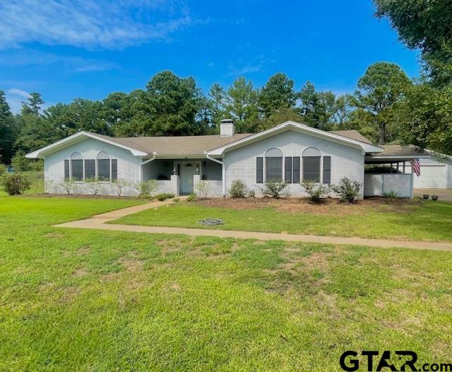 a view of a house with a big yard