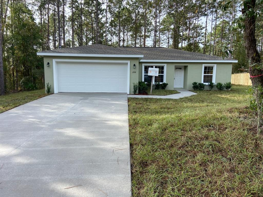 front view of house with a yard